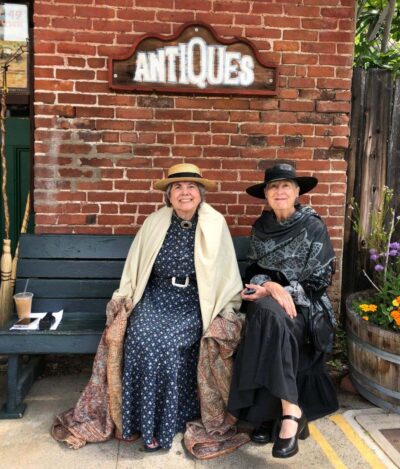 two women in old fashioned clothing