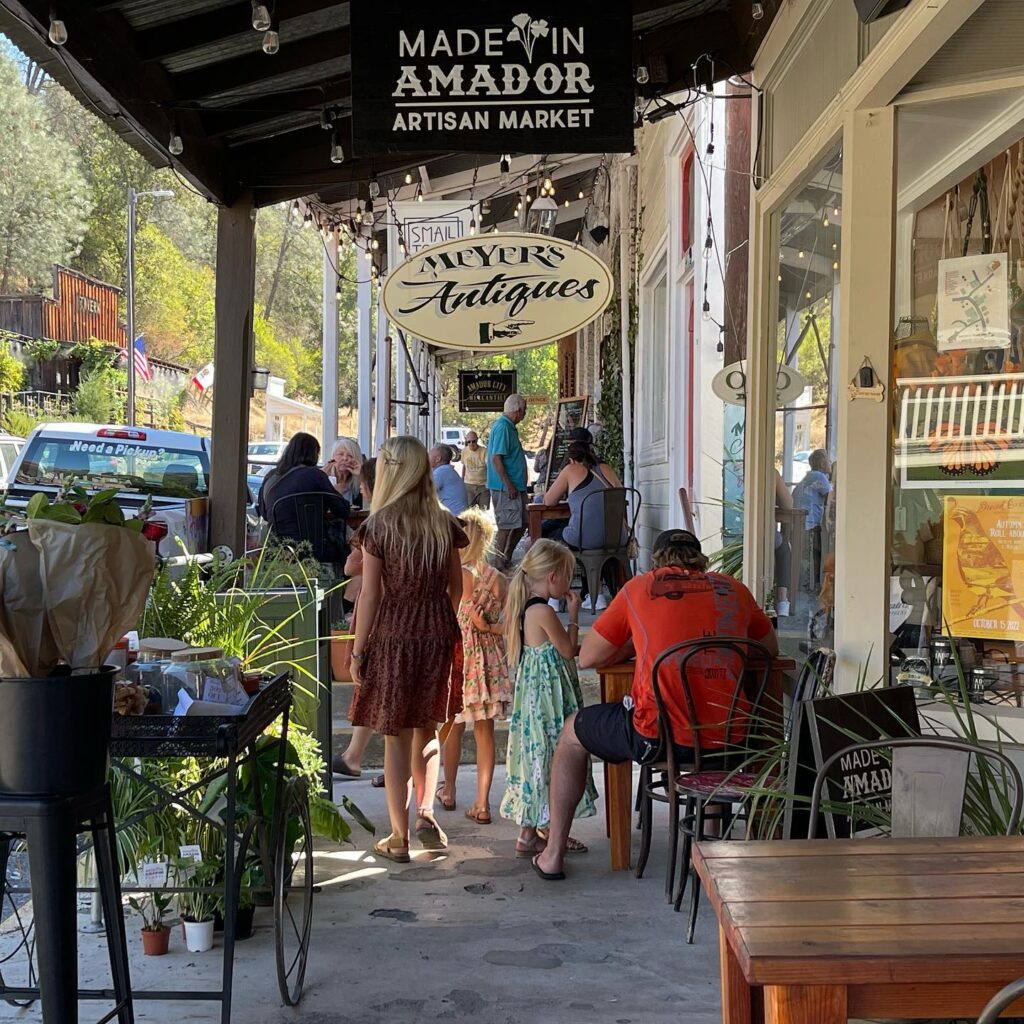 events people on sidewalk in amador city