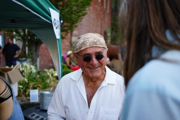 man in sunglasses smiling